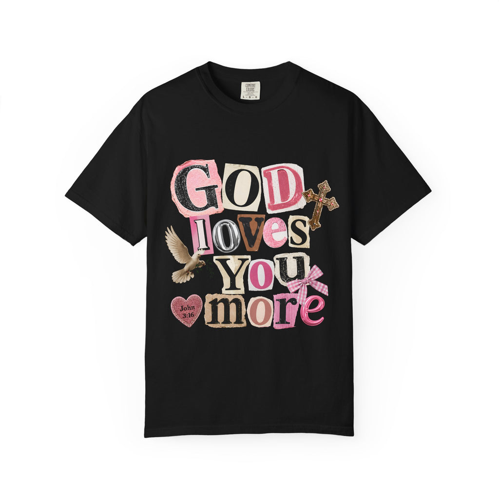 God Loves You More Christian faith t-shirt in black, flat lay showing full collage graphic with dove, cross, heart, and John 3:16 scripture detail
