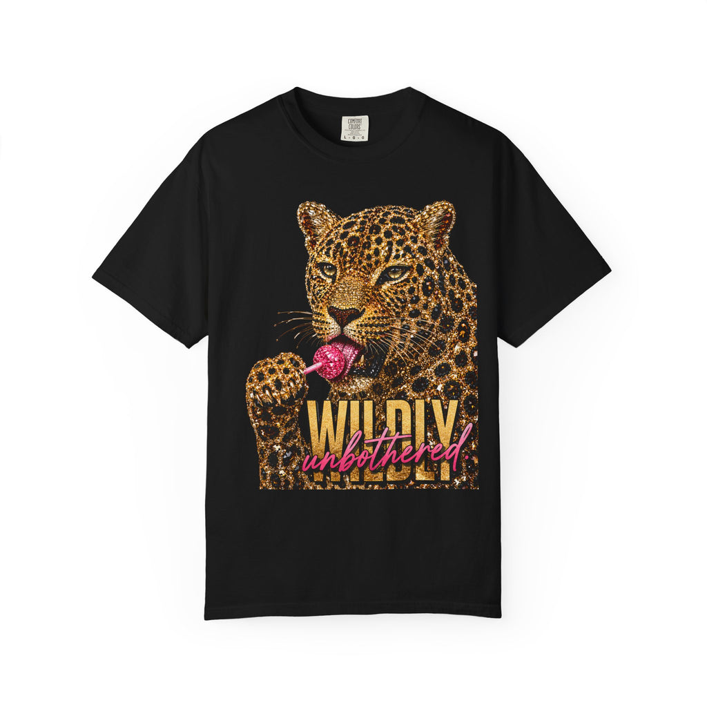 A black short-sleeve crewneck t-shirt featuring a graphic print of a leopard with a pink lollipop and the text 'WILDLY unbothered' in gold and pink lettering.
