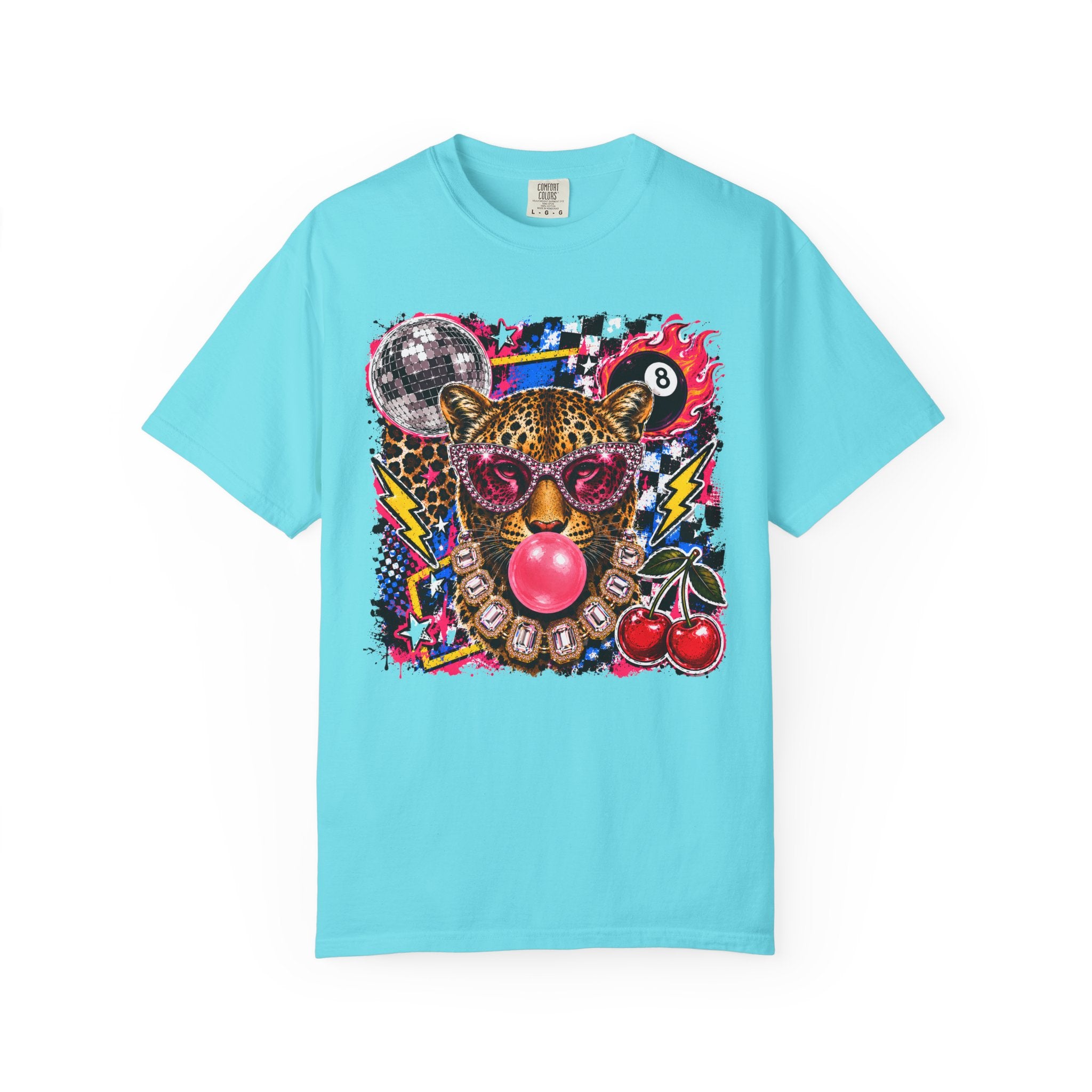 A lagoon blue short-sleeve crewneck t-shirt featuring a vibrant, multicolored graphic print of a leopard wearing pink sunglasses and blowing a pink bubblegum bubble, surrounded by cherries, a disco ball, and lightning bolts.