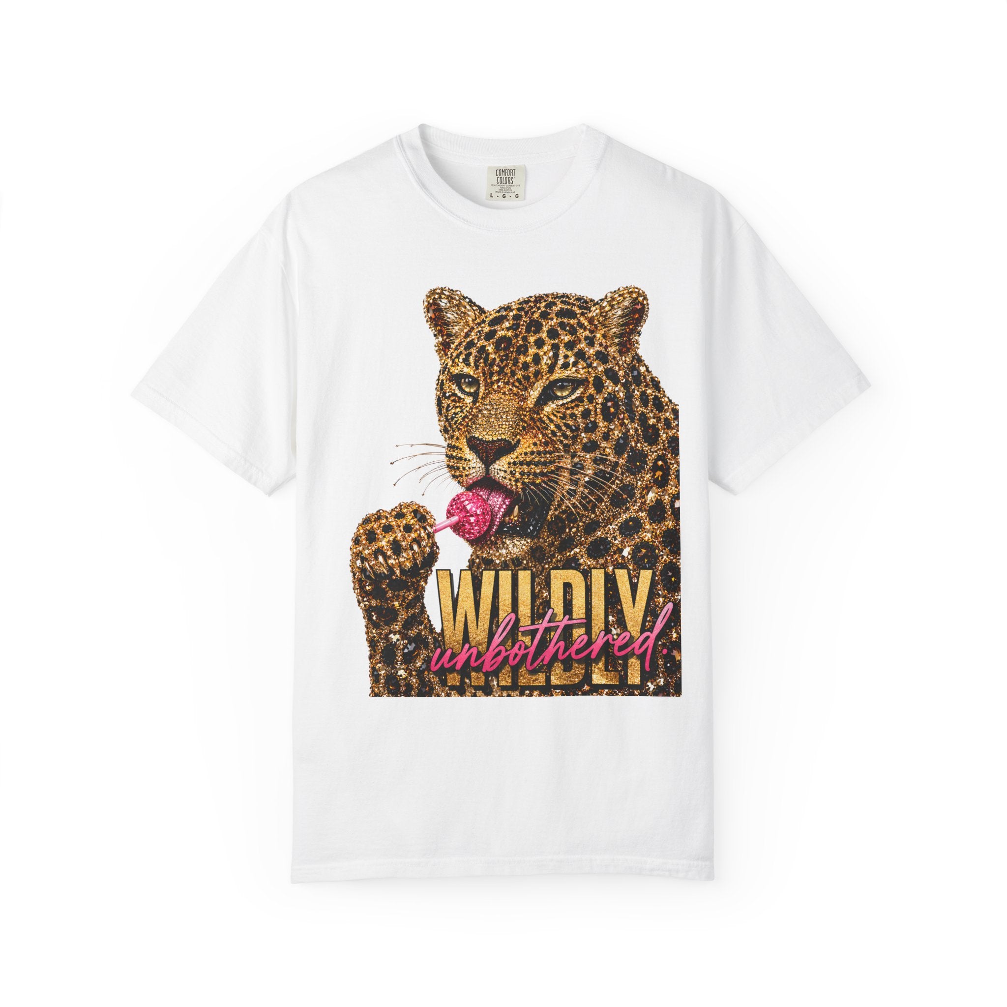 A white short-sleeve crewneck t-shirt featuring a graphic print of a leopard licking a pink lollipop, with the text 'WILDLY unbothered' printed below.