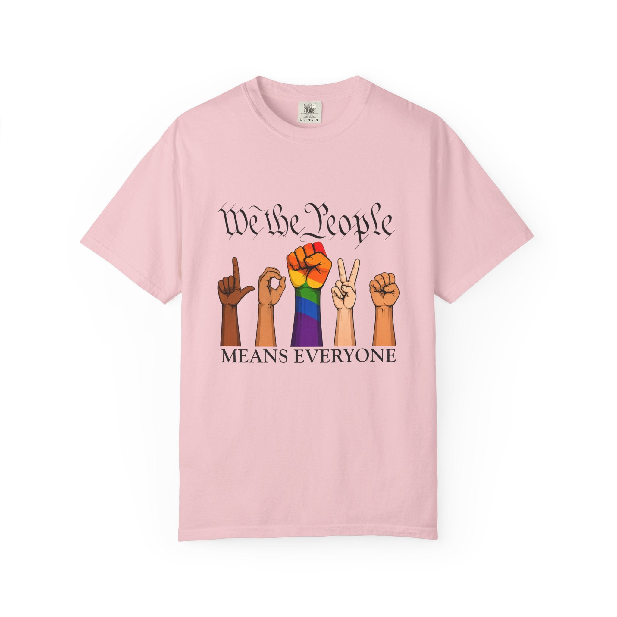 Blossom unisex graphic T-shirt featuring the phrase "We The People Means Everyone" with diverse illustrated hands spelling "LOVE" in sign language, an LGBTQ+ rainbow  raised fist in between. Inclusive Pride and equality statement shirt for everyday wear.